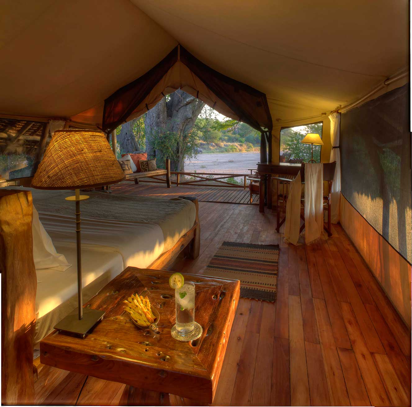 Jongomero Camp interior Guest tent view of veranda