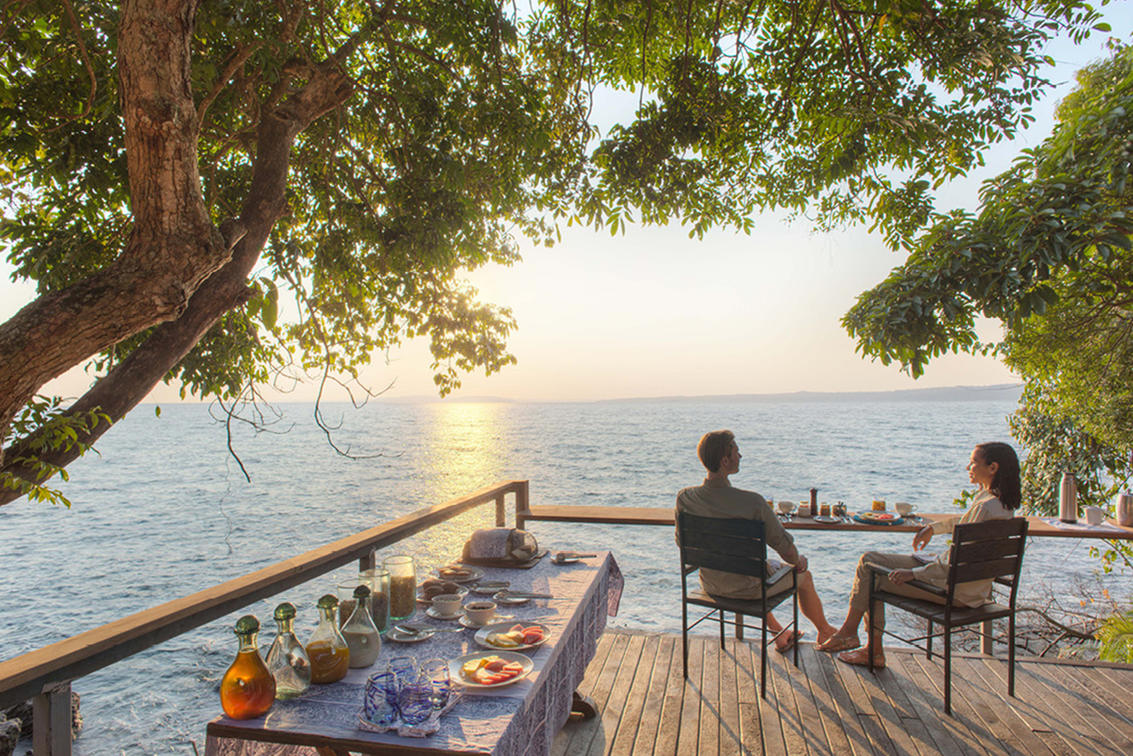 Rubondo Island Camp breakfast set up on deck overlooking Lake Victoria