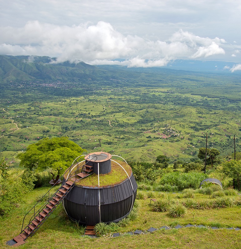 Aramaga Rift Valley Lodge exterior view of earth pod & step to observatory